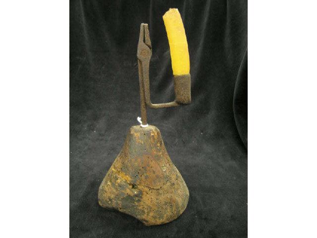 Appraisal: Early Lighting iron candle holder in wood base