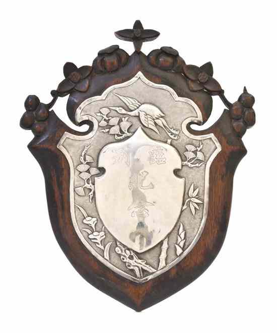 Appraisal: A Chinese Silver and Hardwood Plaque the shield form silver