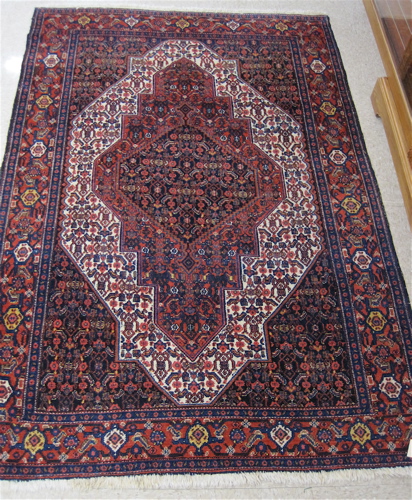 Appraisal: SEMI-ANTIQUE PERSIAN AREA RUG overall Herati floral decoration on blue