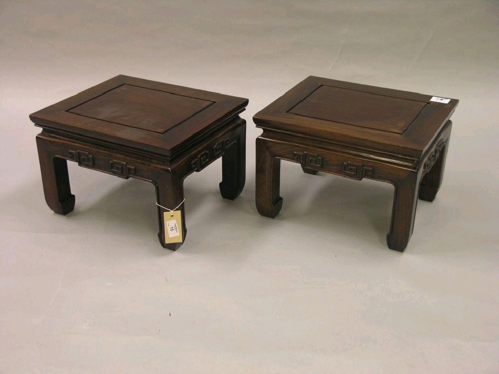 Appraisal: A pair of Chinese rosewood jardiniere stands square shape with