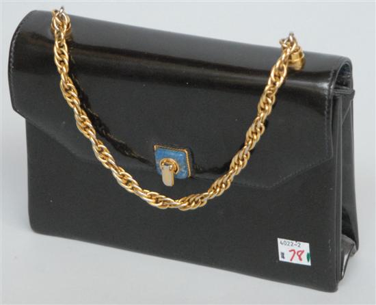 Appraisal: A BROWN PATENT LEATHER GUCCI BAG Having a gilt chain