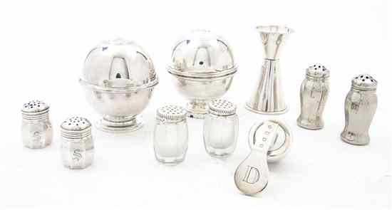 Appraisal: A Set of French Silver Pepper Grinders each of hinged