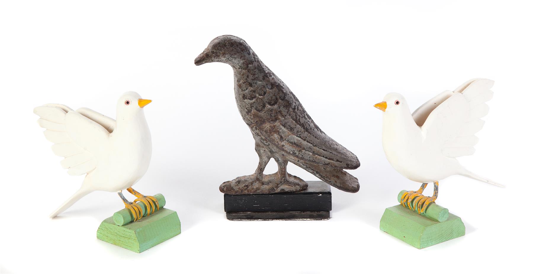 Appraisal: THREE BIRDS American late th-mid th century Cast iron bird