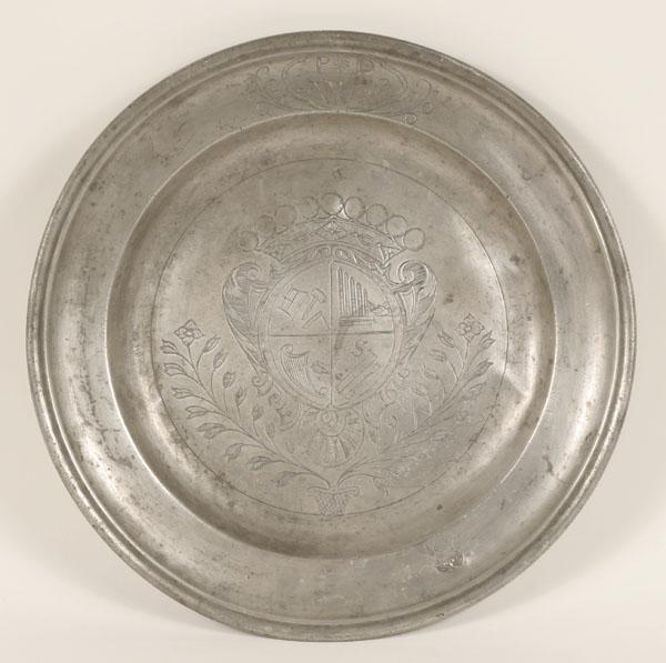 Appraisal: Pewter charger with crest engraved coat-of-arms florals etc from French