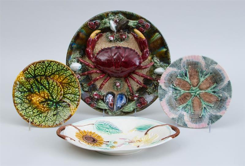 Appraisal: GROUP OF FOUR MAJOLICA TABLE ARTICLES Including a charger two