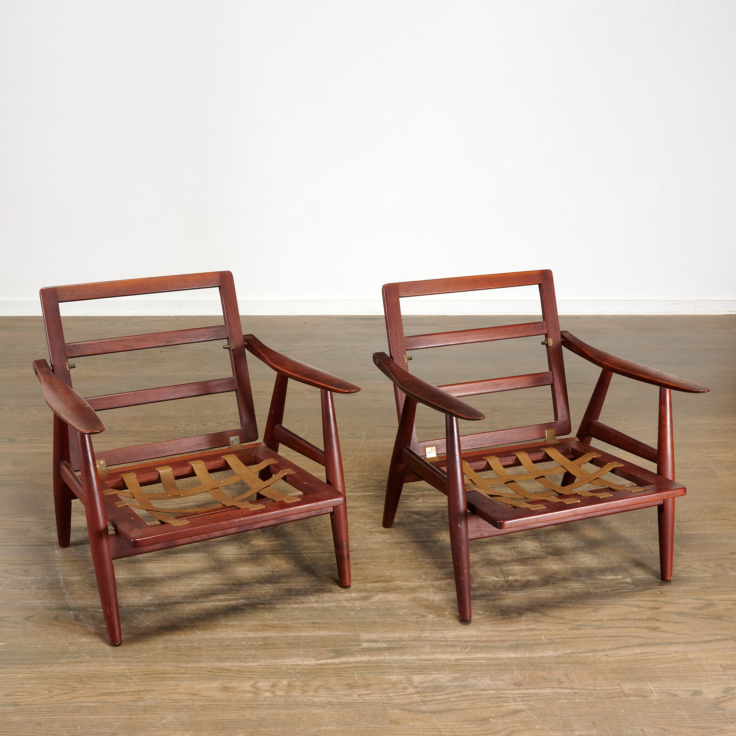 Appraisal: HANS WEGNER PAIR MODEL GE LOUNGE CHAIRS c Denmark teak