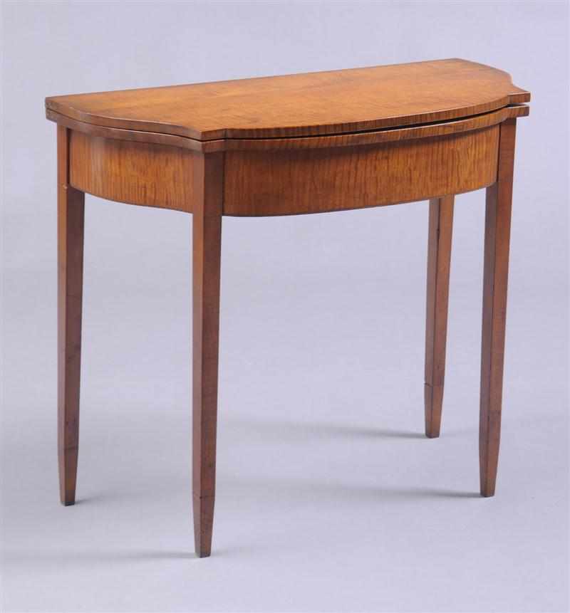 Appraisal: NEW ENGLAND FEDERAL FIGURED MAPLE CARD TABLE The shaped serpentine