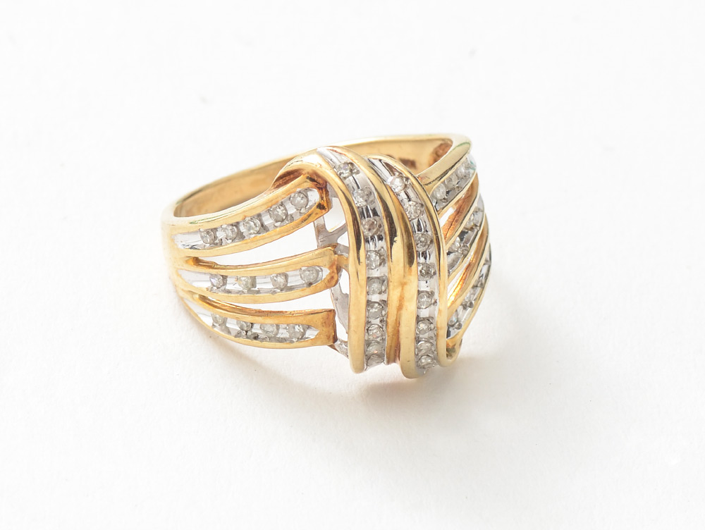 Appraisal: DIAMOND AND GOLD RIBBON COCKTAIL RING Round Single Cut Diamonds