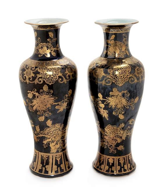 Appraisal: A Pair of Gilt Decorated Black Glazed Porcelain Vases Each