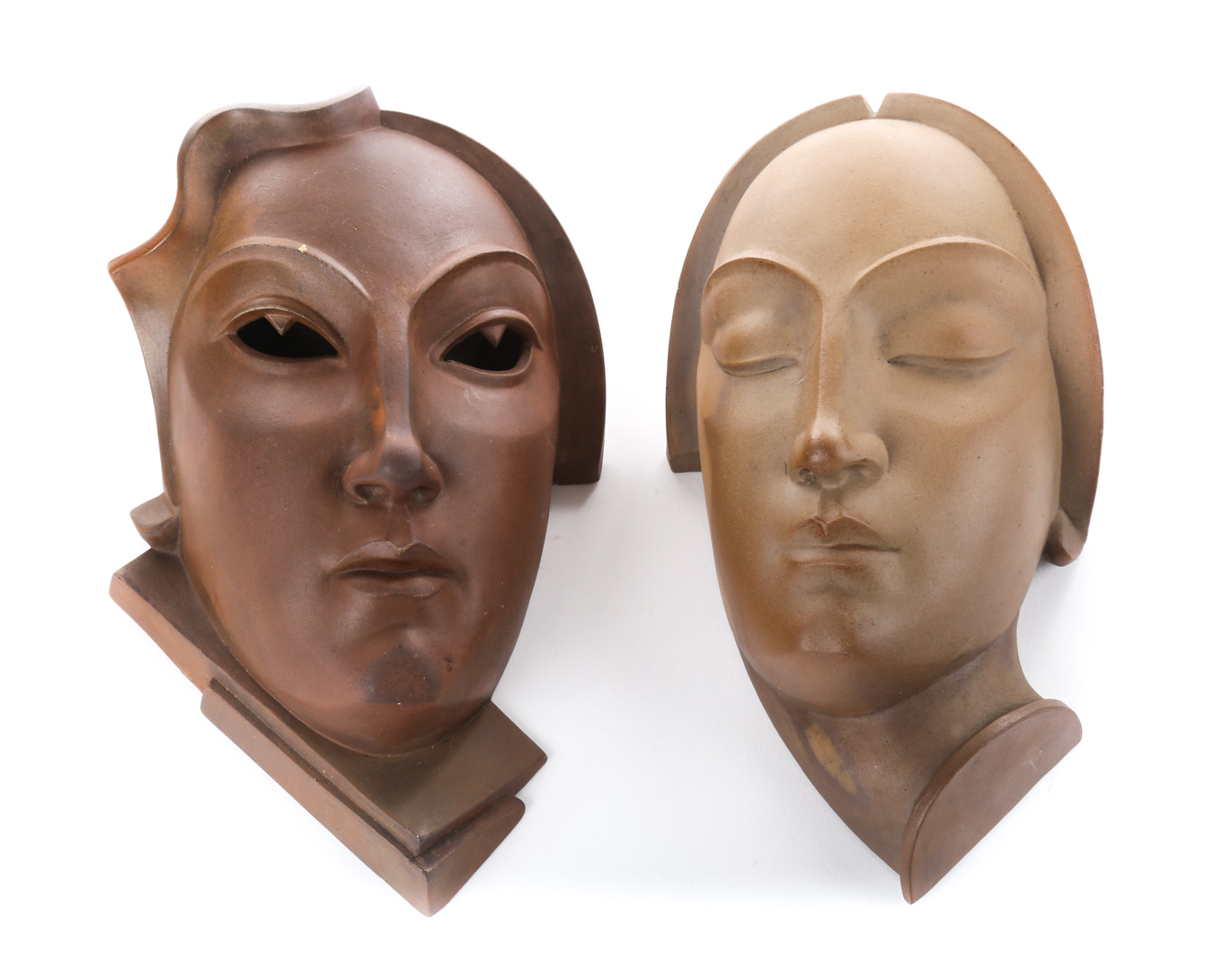 Appraisal: Gerhard Schliepstein Nacht masks German - Pair of stylized terracotta