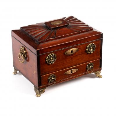 Appraisal: A Regency mahogany jewel box of sarcophagus shape the interior