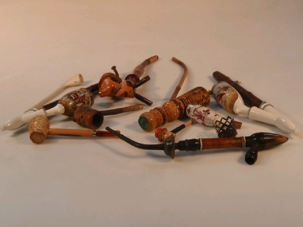 Appraisal: A collection of Bavarian and other pipes including two with