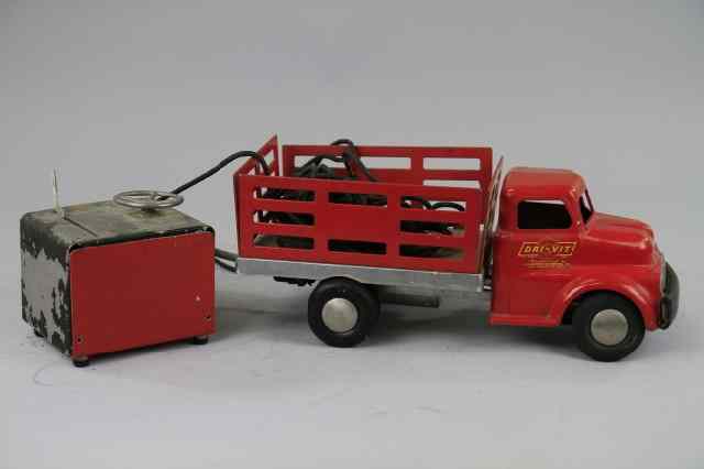 Appraisal: DRI-VIT REMOTE CONTROL TOY TRUCK C 's made by the