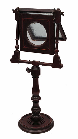 Appraisal: A GEORGIAN MAHOGANY ZOGRASCOPE with pivoting lens and mirror on