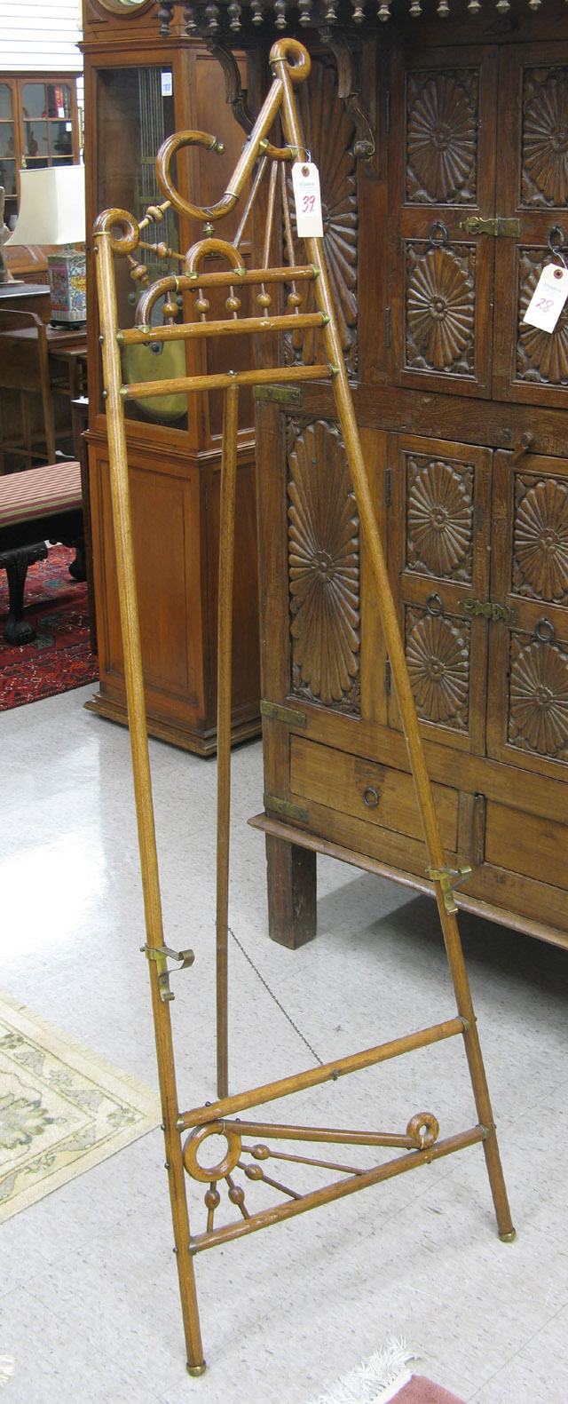 Appraisal: AN AMERICAN VICTORIAN ART DISPLAY EASEL of curved oak wood