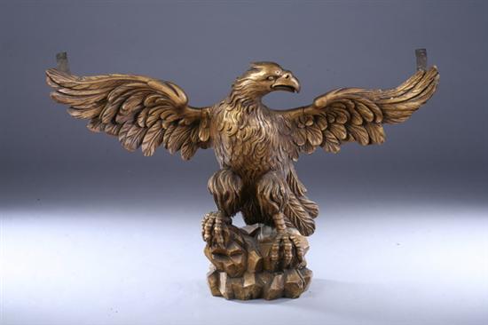 Appraisal: LATE FEDERAL CARVED GILT-WOOD EAGLE circa - Perched on rockery