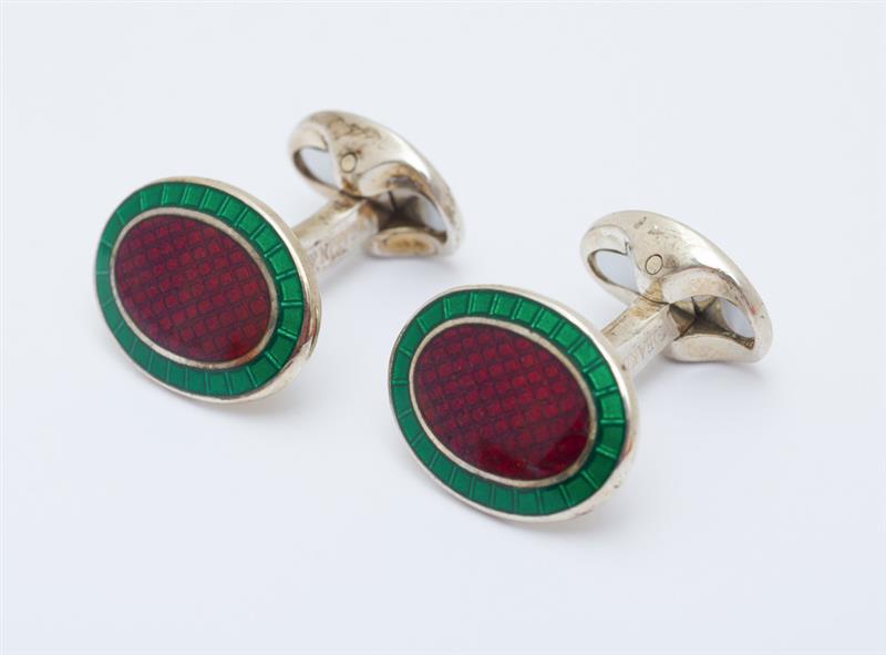 Appraisal: PAIR OF DEAKIN FRANCIS SILVER AND ENAMEL CUFFLINKS With makers