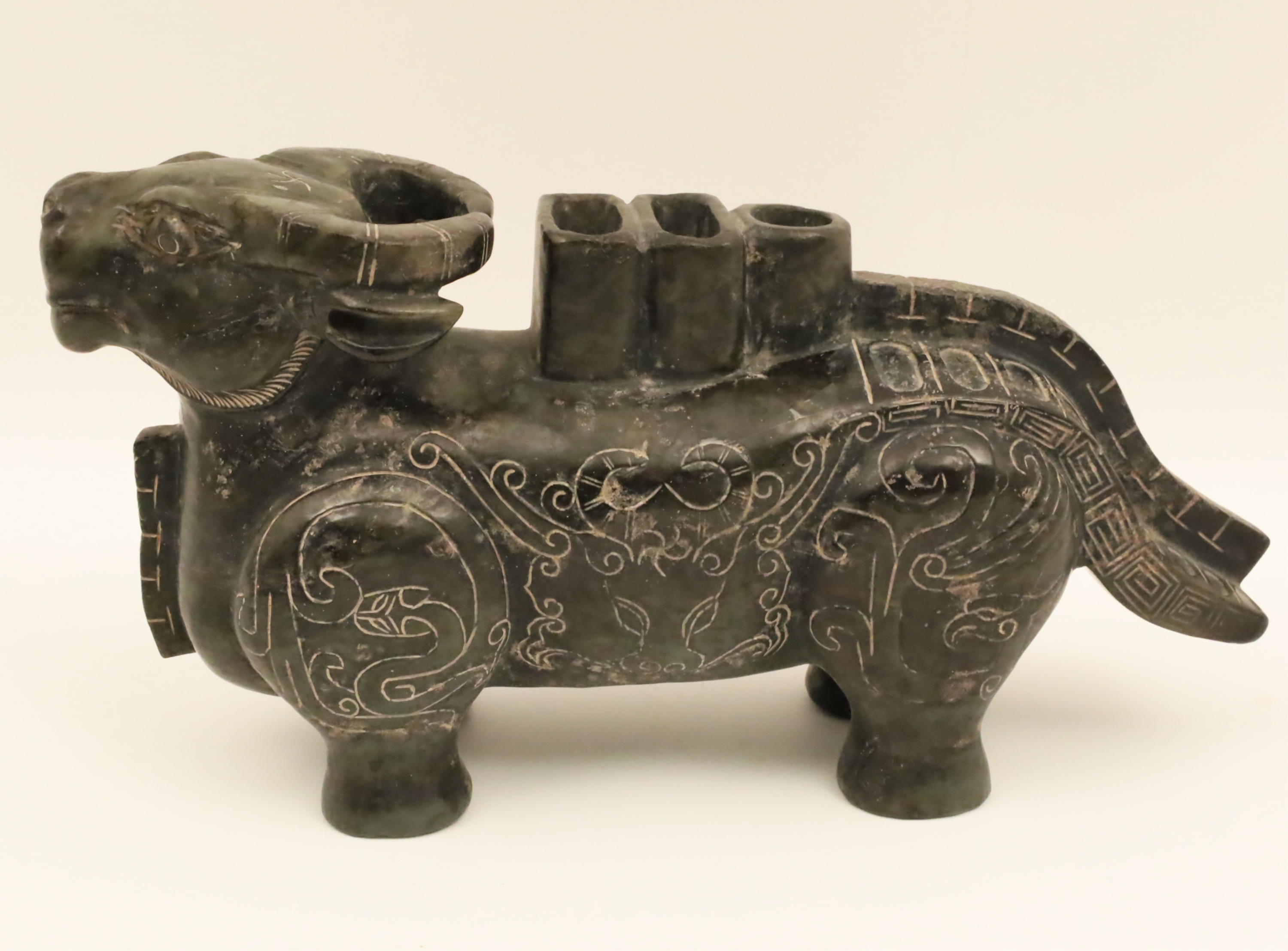 Appraisal: CHINESE CARVED STONE WATER BUFFALO Detailed carvings across bottom with