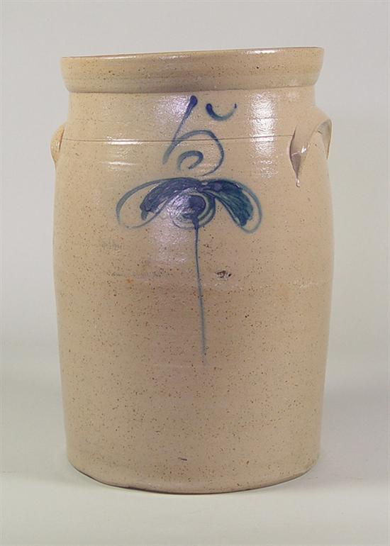 Appraisal: American Stoneware Churn Late th Century Slip with stylized butterfly