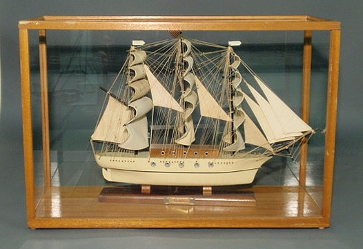 Appraisal: Mahogany cased clipper ship model th c h x l