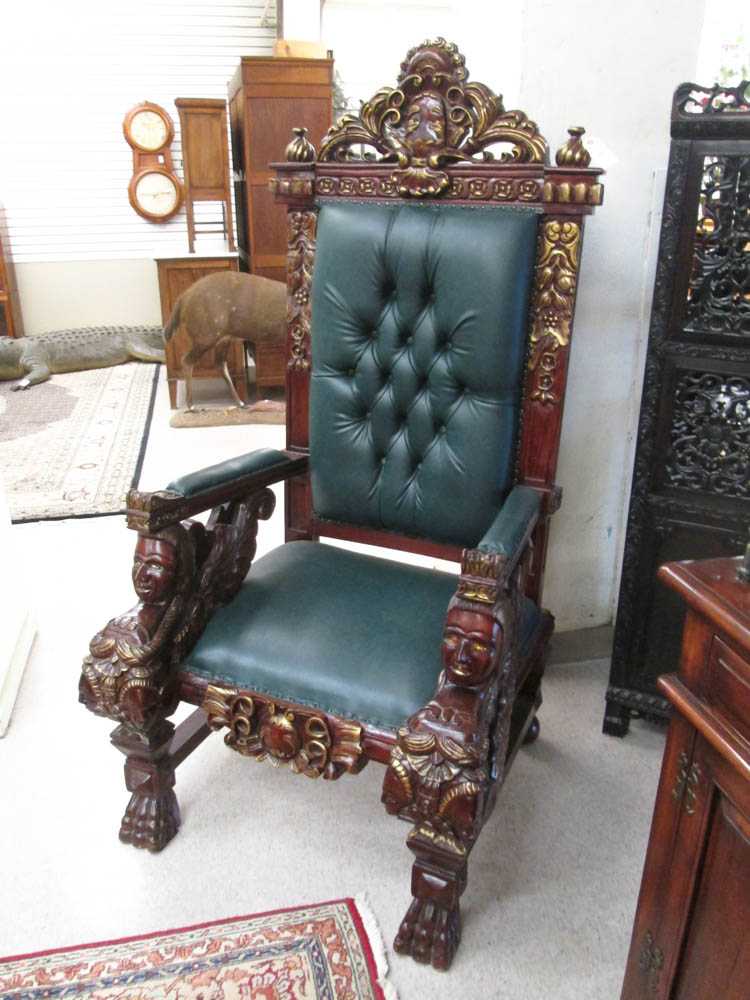 Appraisal: LARGE CARVED AND PARCEL-GILT MAHOGANY THRONE CHAIR with tufted green