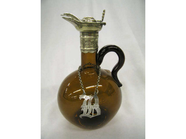 Appraisal: Victorian Amber Glass Decanter silverplate trim and silver tag