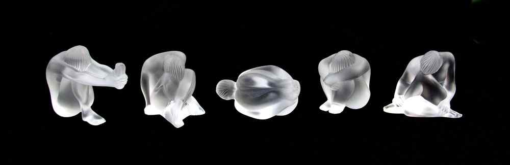 Appraisal: LALIQUE FRENCH CRYSTAL NUDE FIGURES Collection of figures in assorted