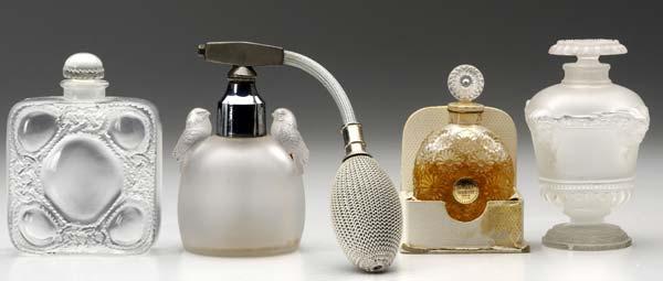 Appraisal: RENE LALIQUE Four perfume bottles of clear and frosted glass