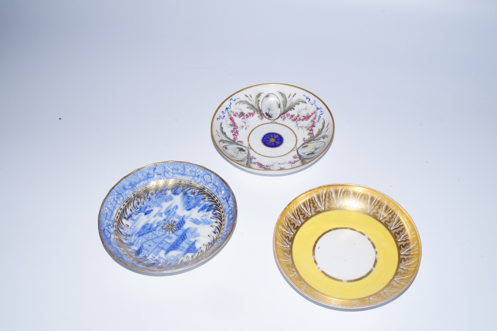 Appraisal: An thC Sevres porcelain saucer with gilt highlights hand painted