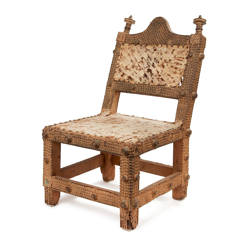 Appraisal: Akan chair Wood with metal tacks brass panels and animal