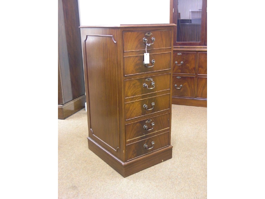 Appraisal: A reproduction mahogany veneered filing chest inset gilt-tooled red leather