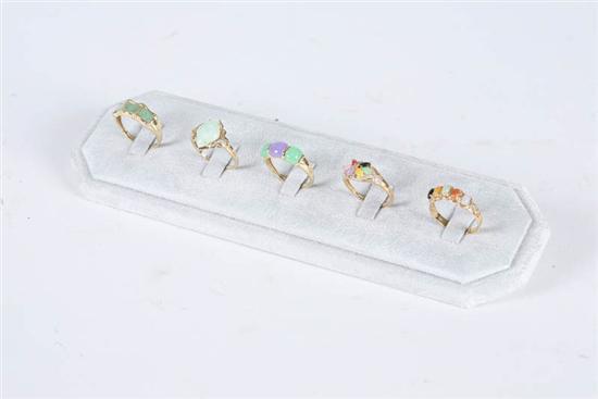 Appraisal: FIVE LADIES RINGS All with various colored stones possibly some