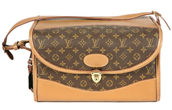 Appraisal: A Louis Vuitton leather vanity case with all-over Louis Vuitton