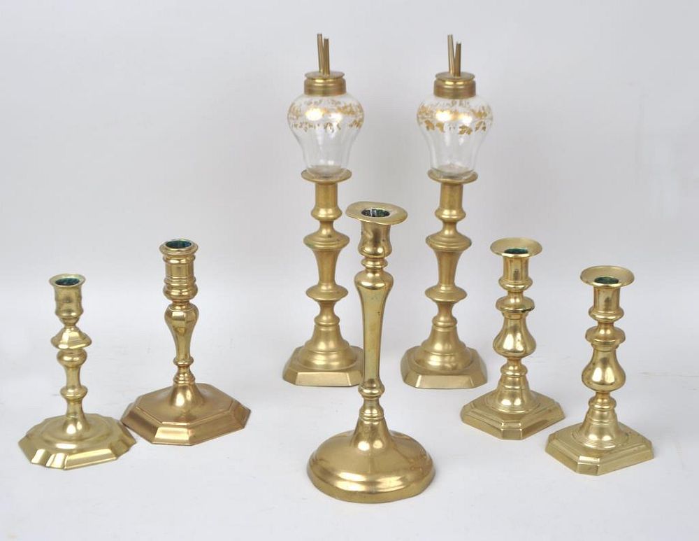 Appraisal: Group Antique Brass Candlesticks comprising whale oil lamp inverters two