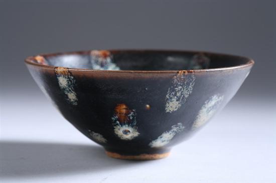 Appraisal: CHINESE JIZHOU STONEWARE TEA BOWL Brown glaze with flamb white