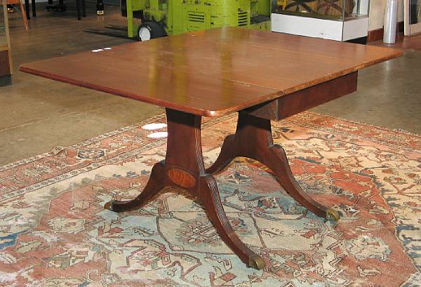 Appraisal: A Regency style mahogany drop leaf dining table mid th