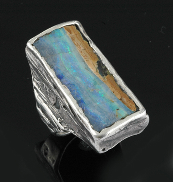 Appraisal: An opal ring by Marylyn Verstraeten The large rectangular boulder