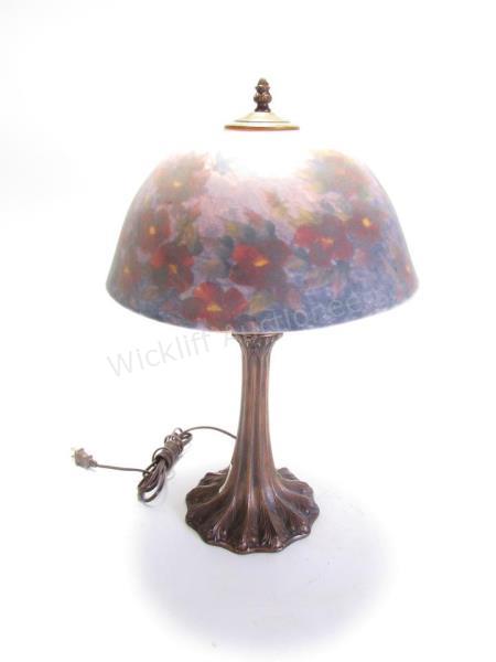 Appraisal: A bronze-finish table lamp with Art Nouveau style base having