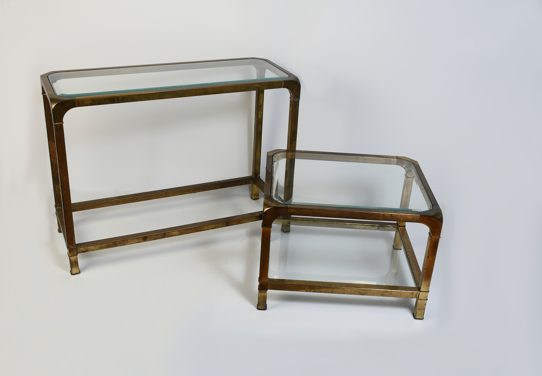 Appraisal: TWO MASTERCRAFT MID CENTURY MODERN BRASS TABLES Consul table with