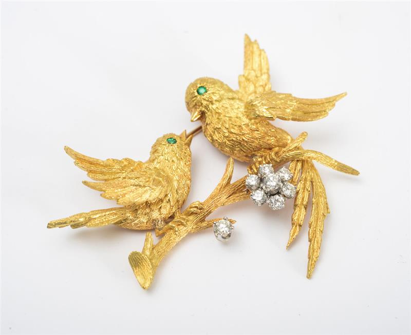 Appraisal: K GOLD PLATINUM DIAMOND AND EMERALD BROOCH Designed as two