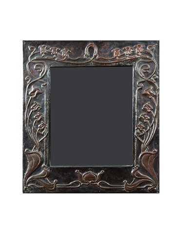 Appraisal: Art NouveauBeaten copper mirror with sinuous floral decoration cm x