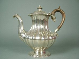 Appraisal: George III silver tea pot of wasted baluster form the