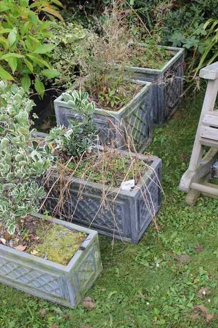 Appraisal: A PAIR OF SQUARE FAUX LEAD PLANTERS with lattice work