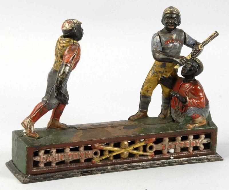 Appraisal: Cast Iron Darktown Battery Mechanical Bank Description Manufactured by J