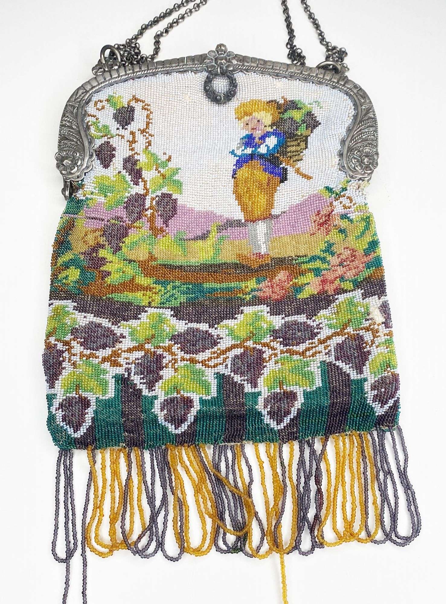 Appraisal: Micro Beaded Hand Bag with Boy with Cornucopia and Un