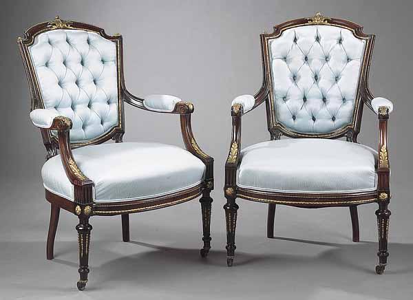 Appraisal: A Pair of Louis XVI-Style Gilt Bronze-Mounted Rosewood Fauteuils mid-