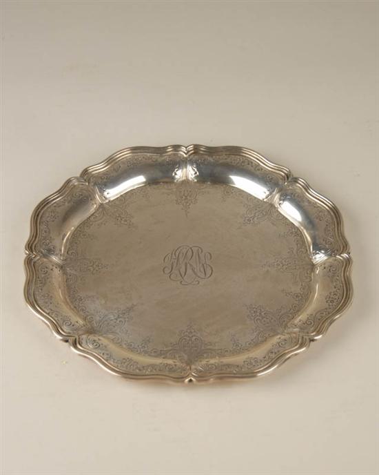 Appraisal: A Sterling Silver Tray by Durgin round with shaped Chippendale-style