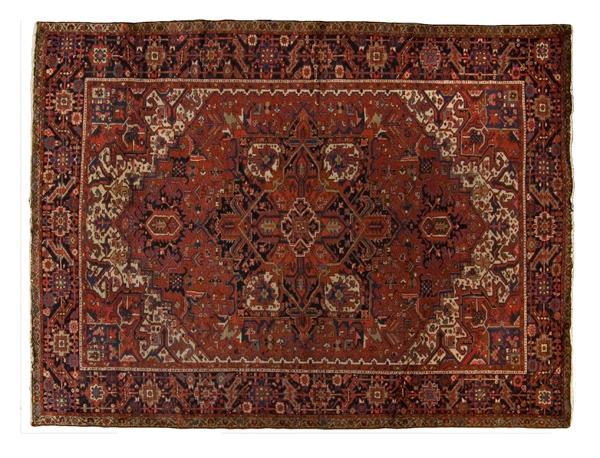 Appraisal: ROOM-SIZED BAKHTIARI RUG Persian ca in deep red ground with