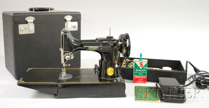 Appraisal: Singer - Electric Sewing Machine in a case