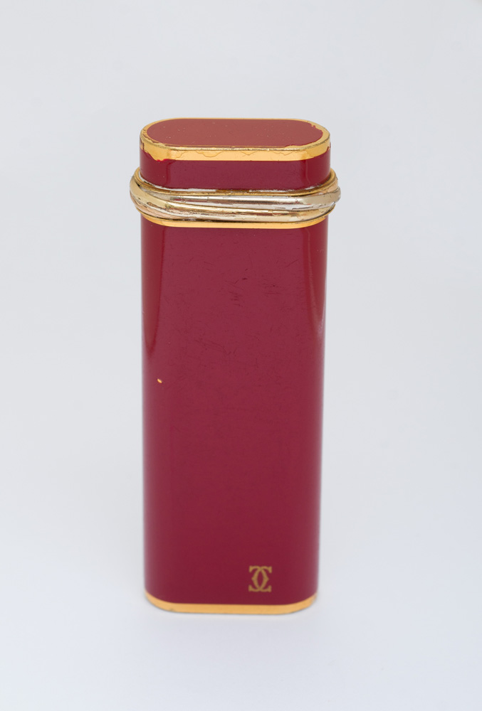 Appraisal: CARTIER GOLD PLATED AND RED LACQUER LIGHTER Signed 'Cartier Made